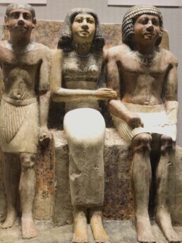 Statue of Seked-kaw, His Wife, and Their Son | Egypt Museum
